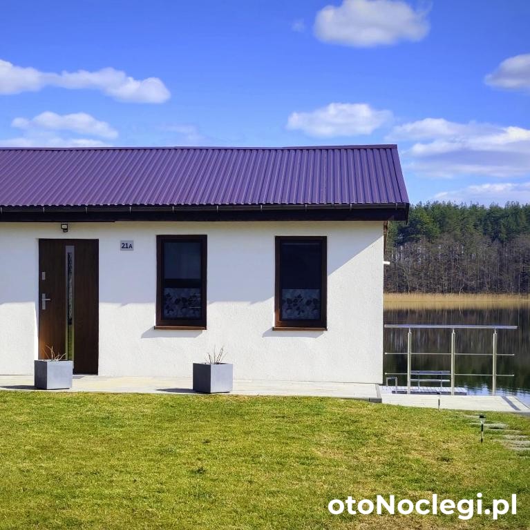 NAD BRZEGIEM JEZIORA – Domek letniskowy Michałki (1)