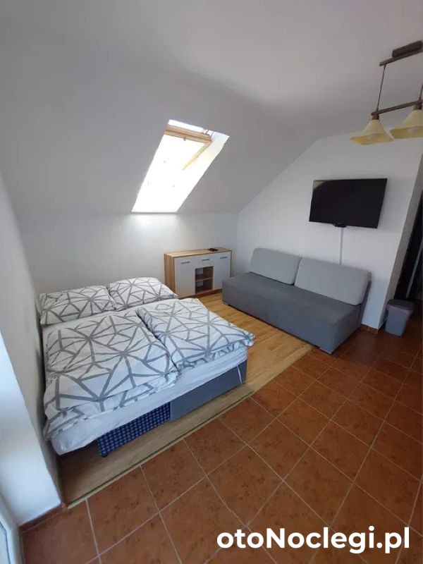 Pokoje i apartamenty Promyk (1)