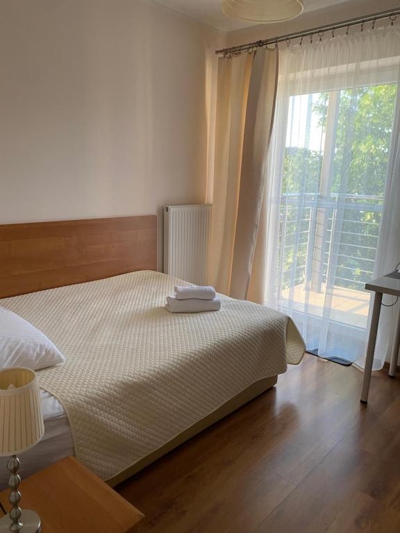 Pokój jednoosobowy z balkonem (cena w sezonie)