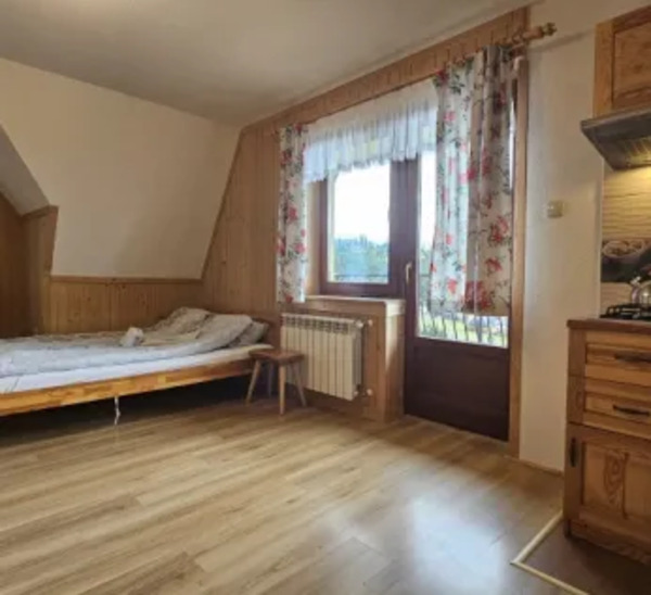 Pokój typu studio z aneksem kuchennym